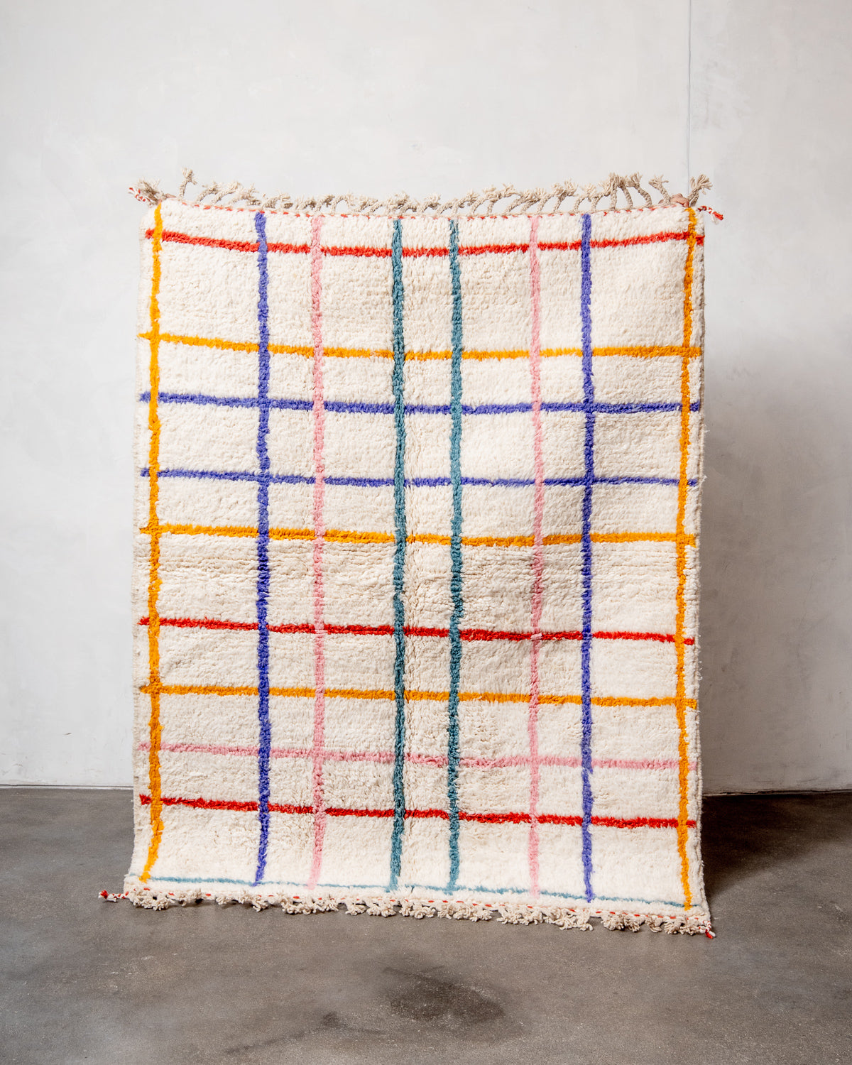 Modern, designer, handcrafted Berber rug from Morocco. Beniourain carpet with beautiful colours and patterns and fluffy wool texture.